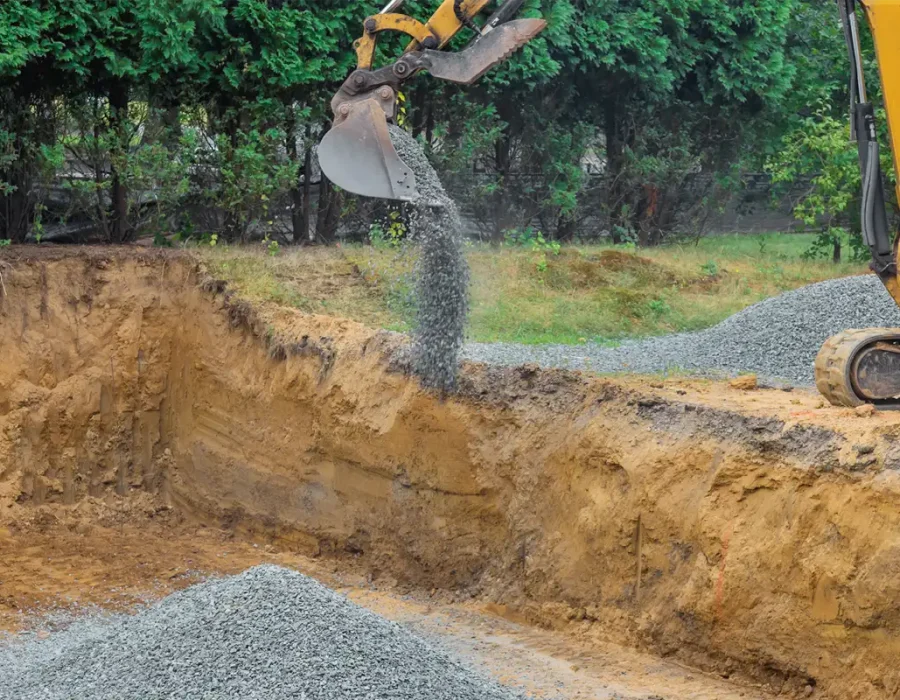 04-02-excavator-backfilling-foundation